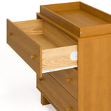 Texas almond 3 drawer chest with changing topper and top drawer open