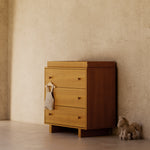 Texas almond 3 drawer chest with topper in a nursery