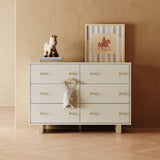 Texas frosted oat with driftwood 6 drawer dresser in a nursery