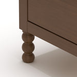 Rio hazelnut 3 drawer chest with changing topper close up of legs