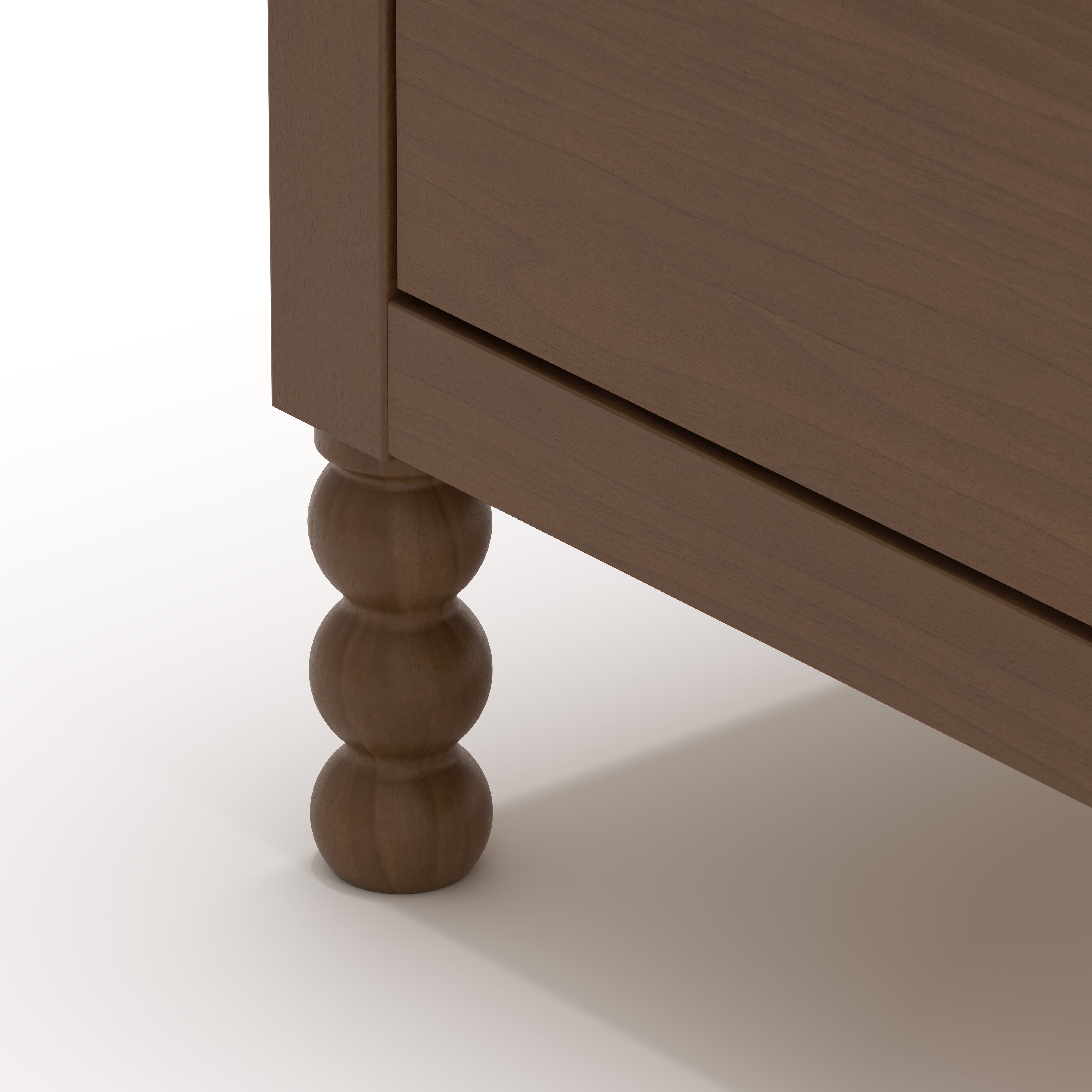 Rio hazelnut 3 drawer chest with changing topper close up of legs