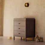 Rio hazelnut 3 drawer chest with topper in a nursery
