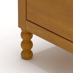 Rio almond 3 drawer chest with changing topper close up of legs