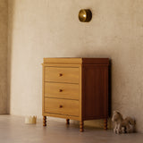 Rio almond 3 drawer chest with topper in a nursery