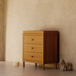 Rio almond 3 drawer chest with topper in a nursery