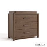 Malta hazelnut 3 drawer chest with changing topper angle view and 2026 Storkcraft copyright on bottom right