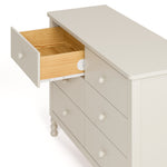 Rio frosted oat 6 drawer dresser with top left drawer open