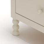Rio frosted oat 6 drawer dresser closeup of feet