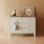 Rio frosted oat 6 drawer dresser in a nursery