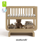Santorini driftwood bassinet with GGG and PTPA logo on top left