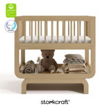 Santorini driftwood bassinet with GGG and PTPA logo on top left