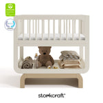 Santorini frosted oat with driftwood bassinet with GGG and PTPA logo on top left