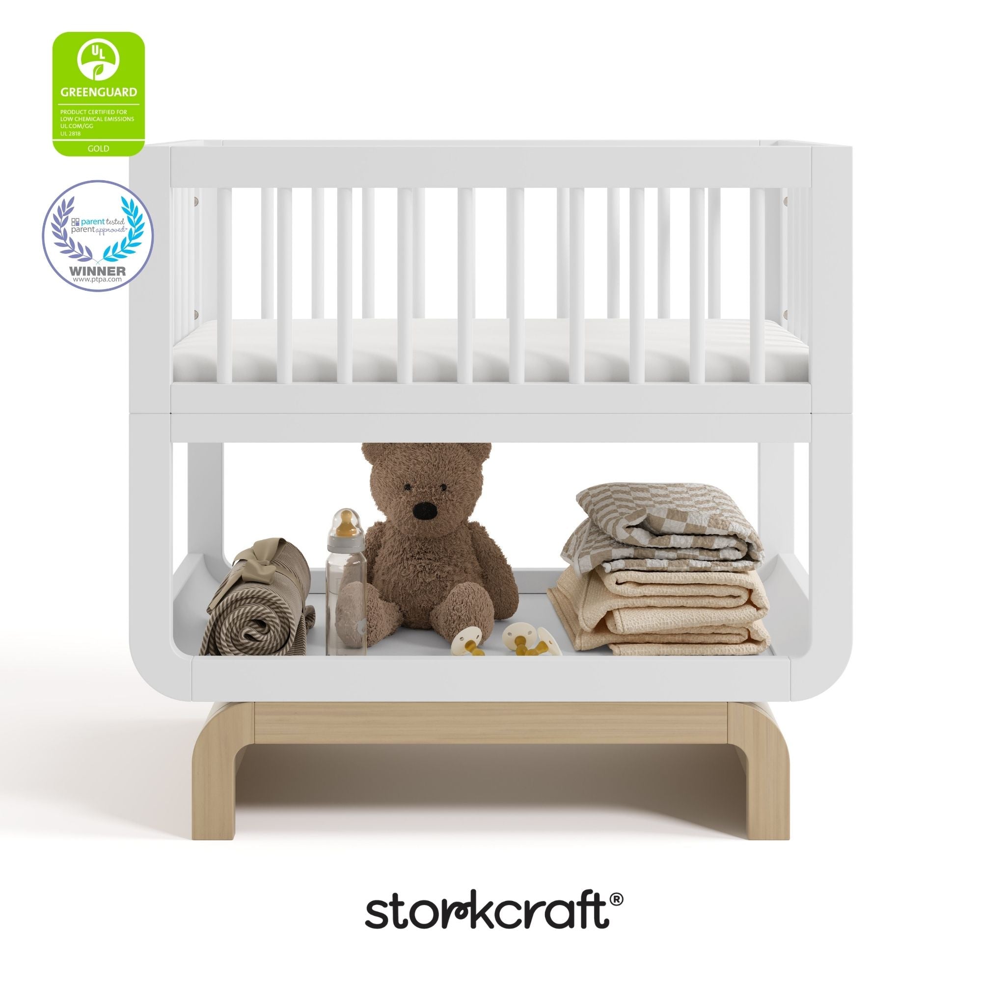 Santorini white with driftwood bassinet with GGG and PTPA logo on top left