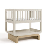 Santorini frosted oat with driftwood bassinet angle view