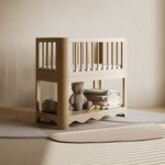 Casablanca driftwood bassinet in a nursery