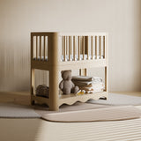 Casablanca driftwood bassinet in a nursery