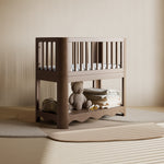 Casablanca hazelnut bassinet in a nursery