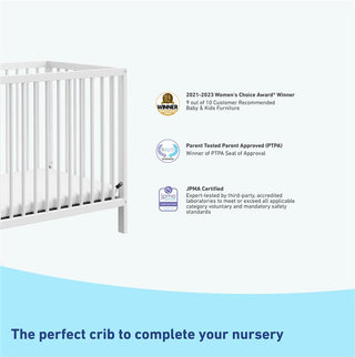 white mini crib with awards and certifications
