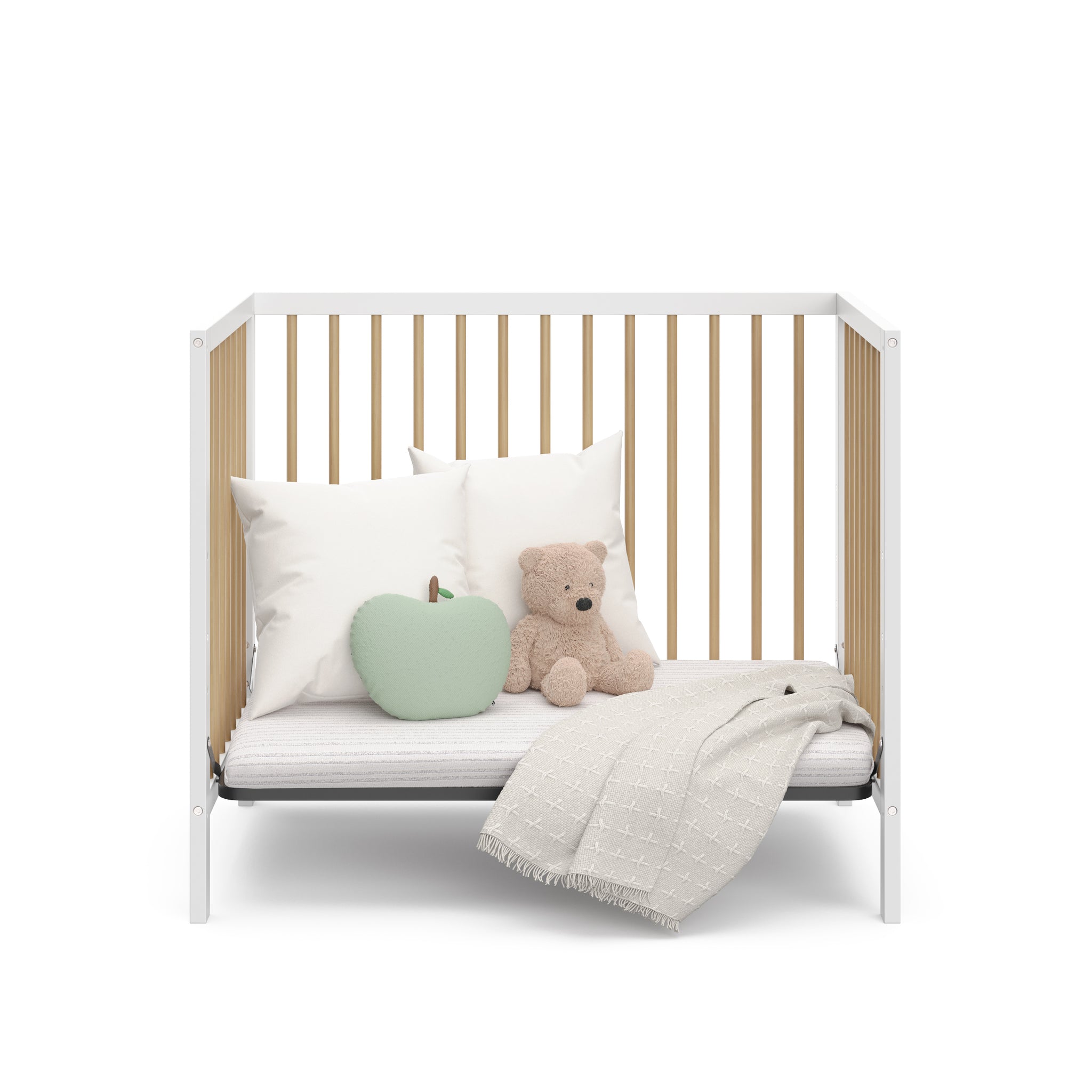 white with driftwood mini crib in daybed conversion