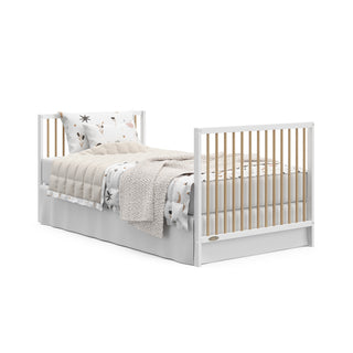 white with driftwood mini crib in full-size bed with headboard and footboard