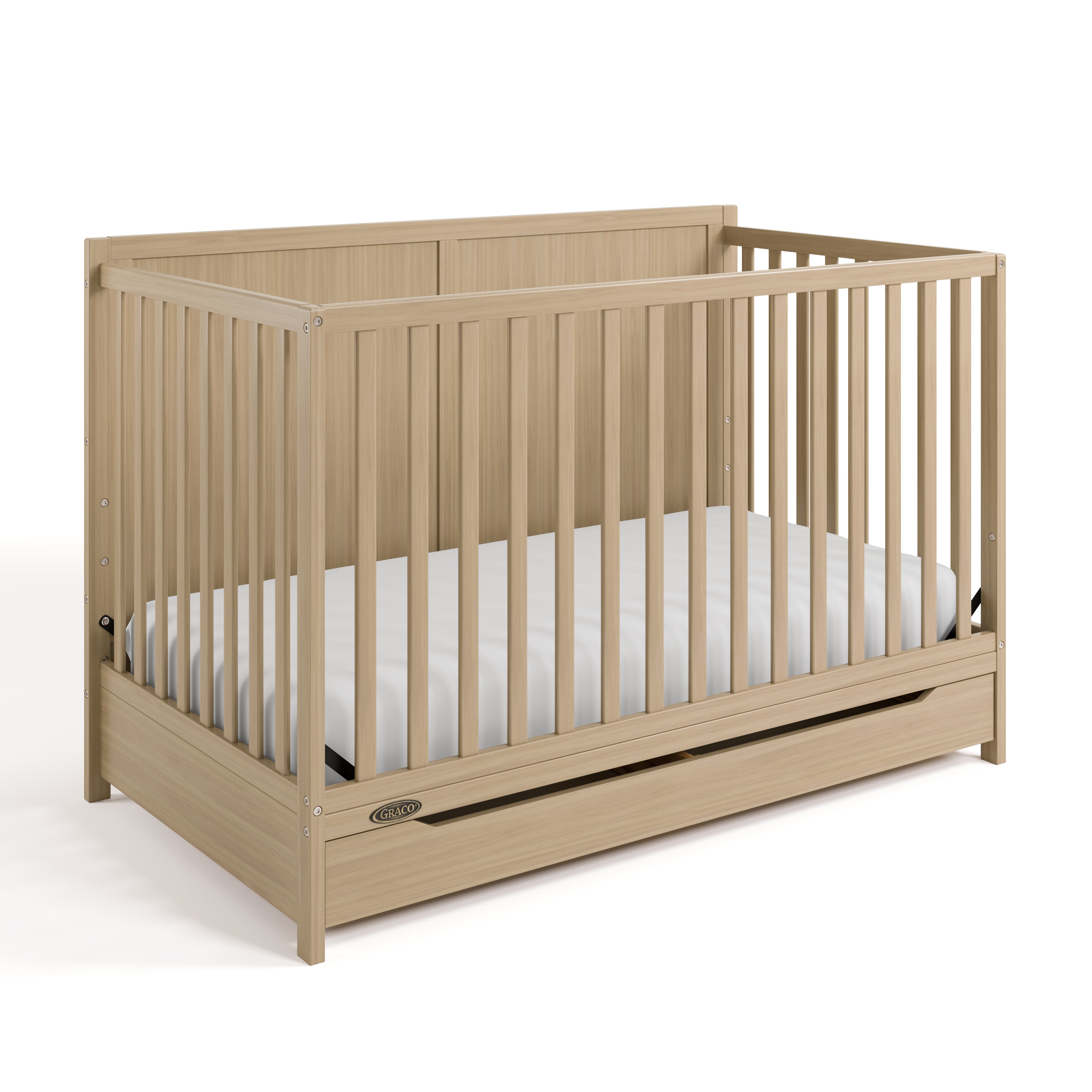 Melrose driftwood crib with drawer closed angle view