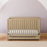Melrose driftwood crib with drawer in a nursery