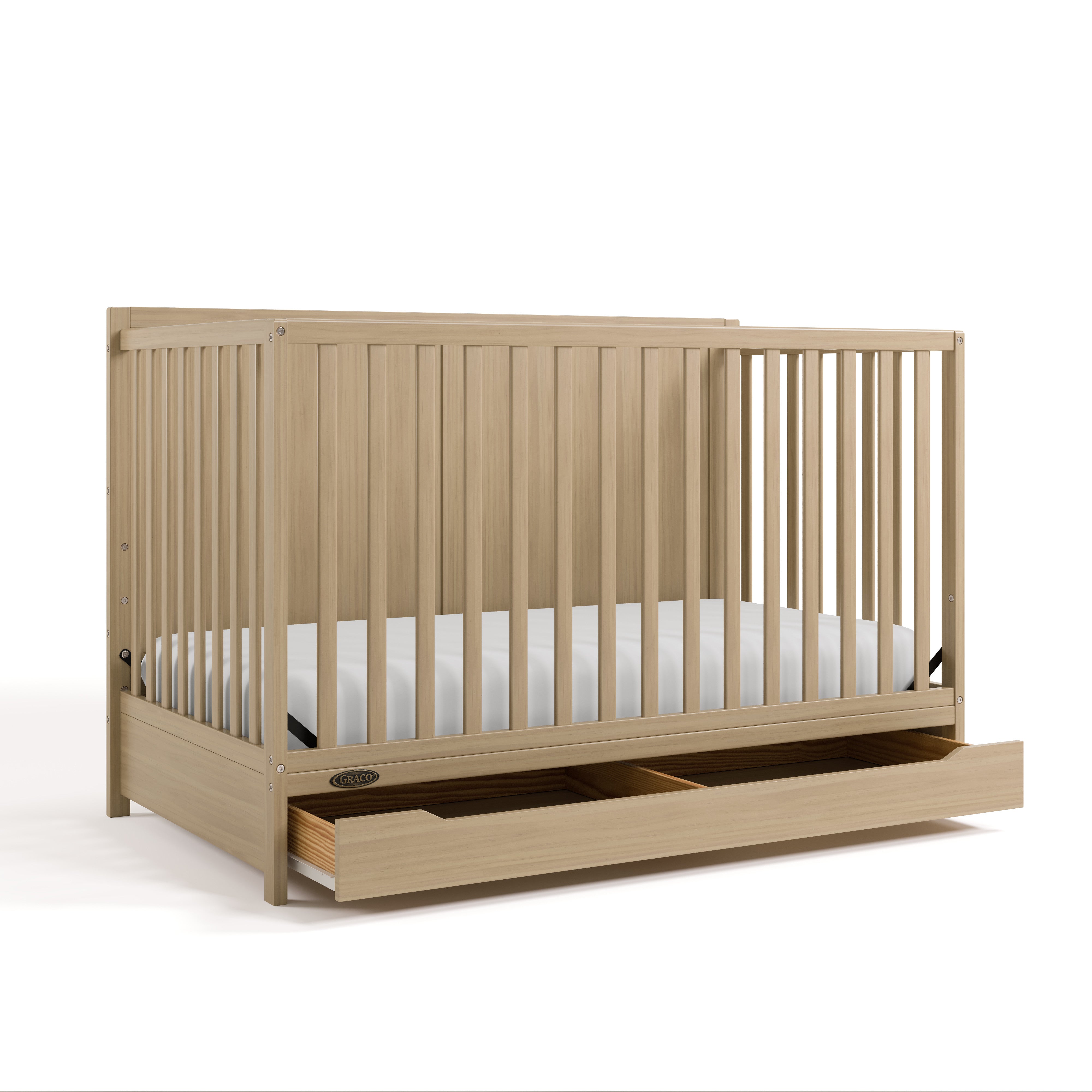 Melrose driftwood crib with drawer angle view