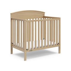 Graco® Benton 4-in-1 Convertible Mini Crib.