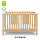 Hillcrest natural crib with GGG and PTPA logo on top left