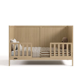 Theo driftwood crib converted to toddler bed