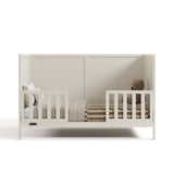 Theo frosted oat crib converted to toddler bed