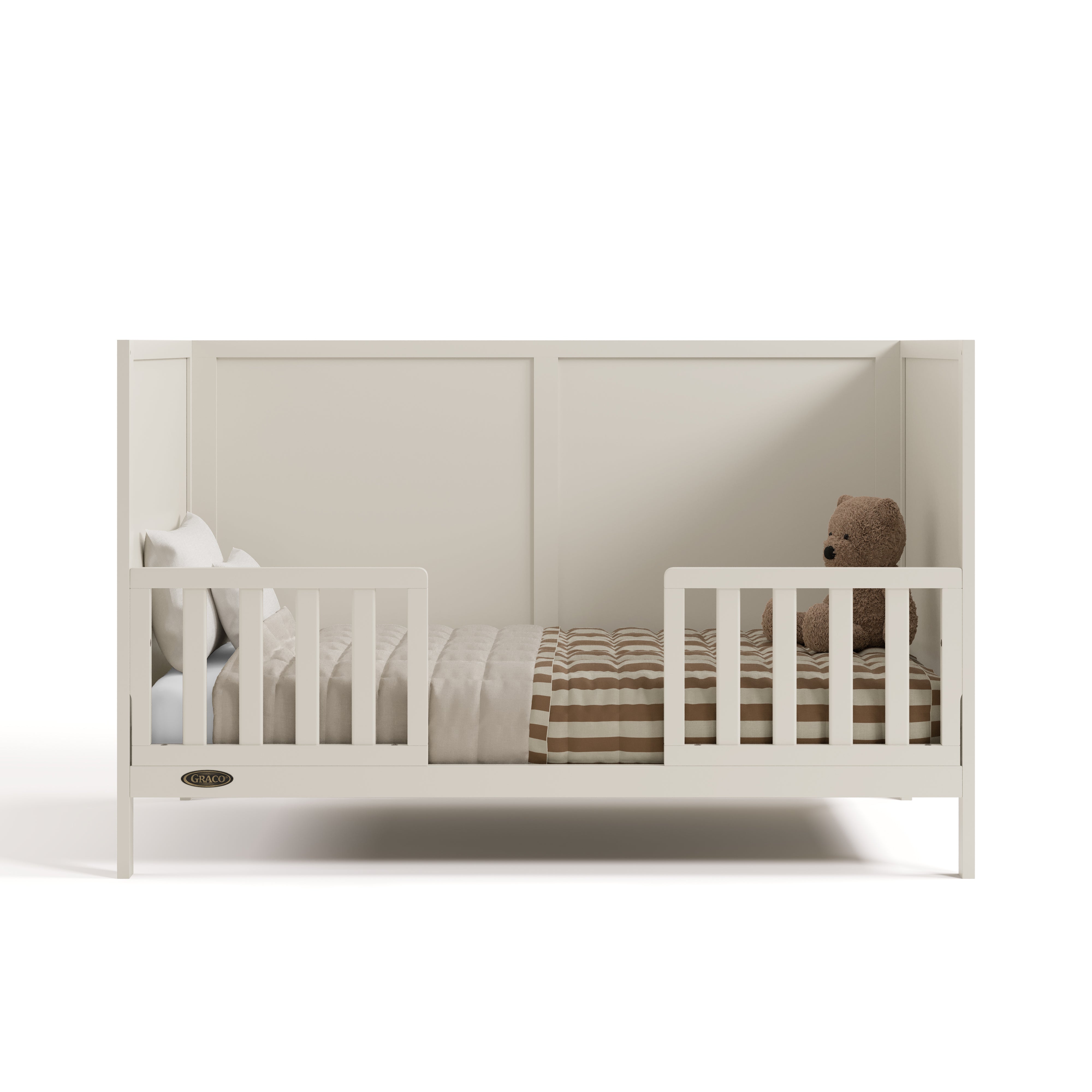 Theo frosted oat crib converted to toddler bed