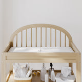 Olivia driftwood changing table close up of headboard and changing pad in a nursery