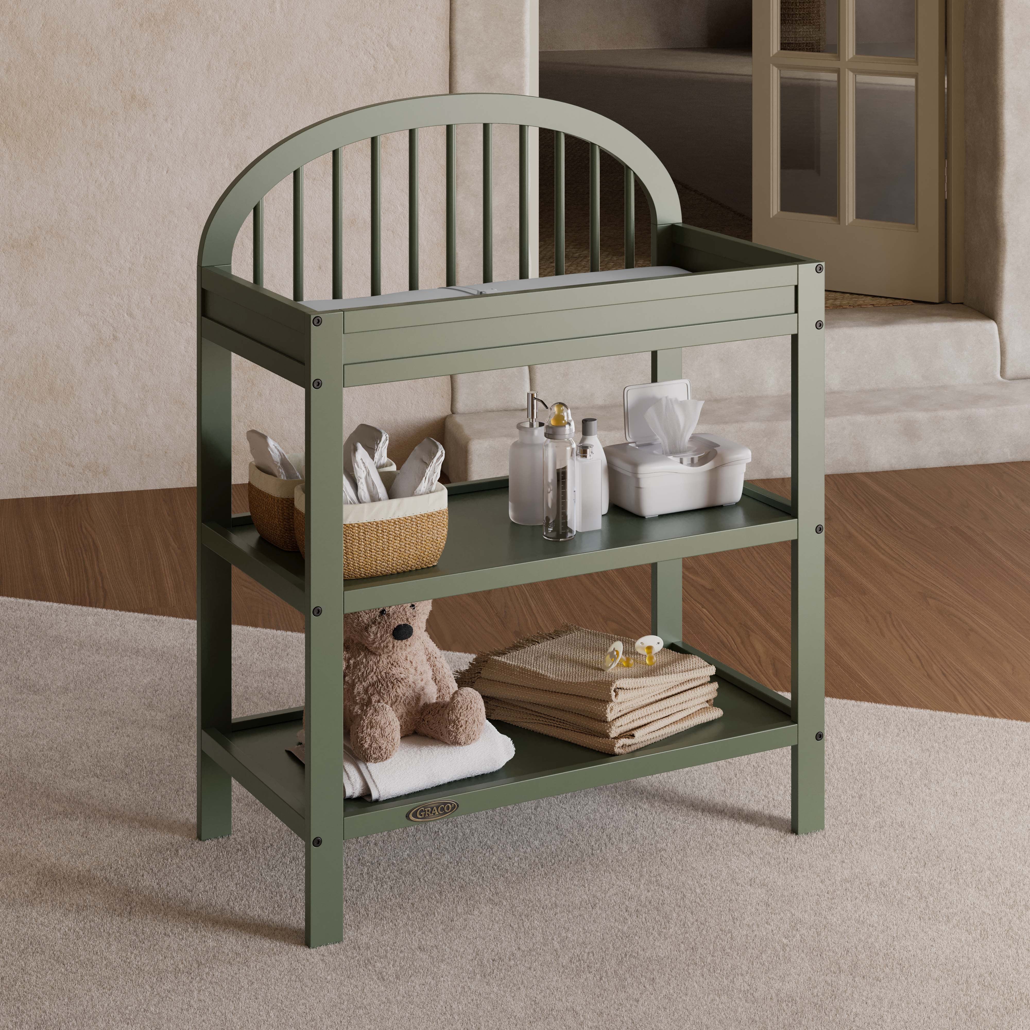Olivia olive changing table in nursery