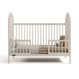 Olivia frosted oat crib converted to toddler bed