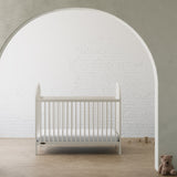 Olivia frosted oat crib in a nursery