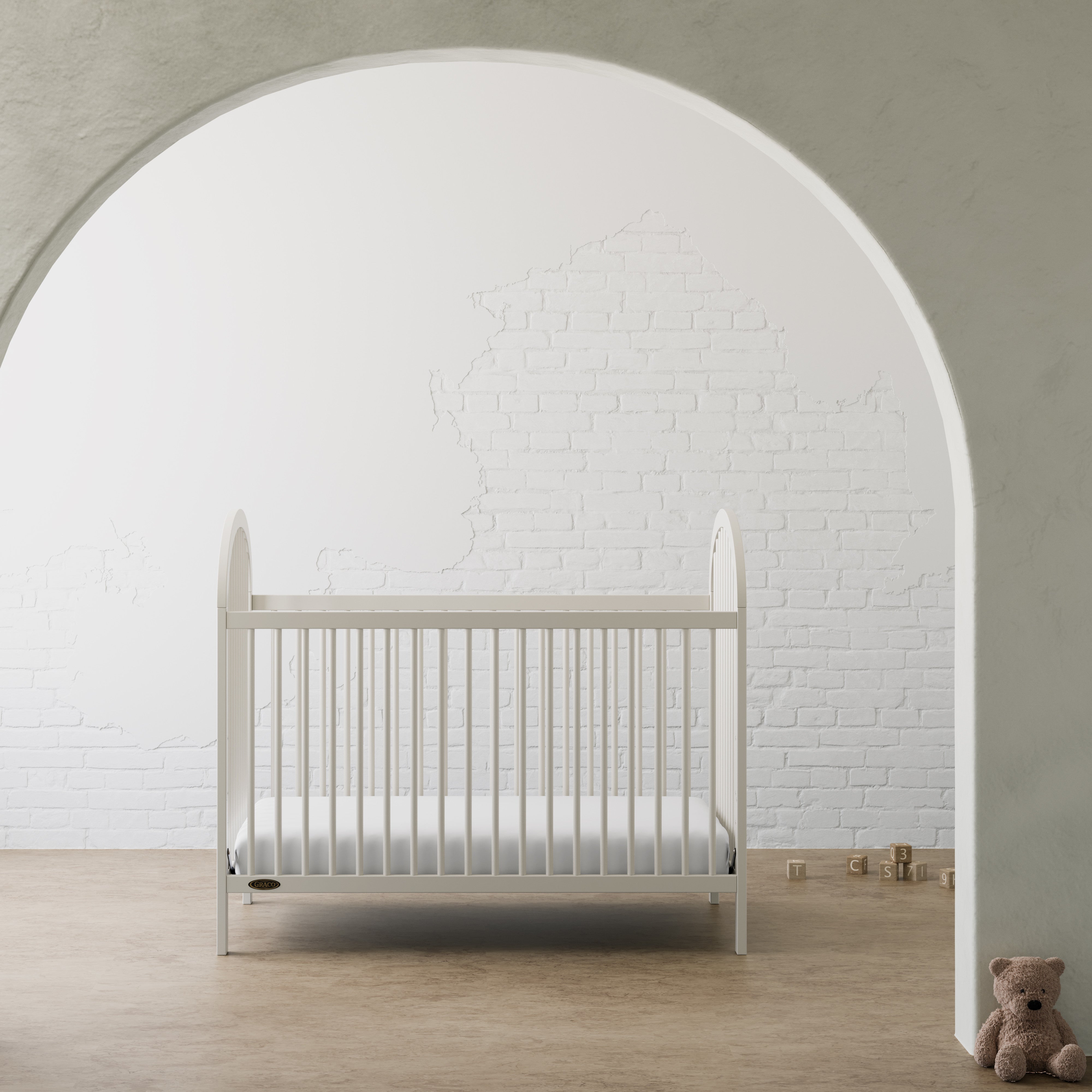 Olivia frosted oat crib in a nursery