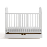 Oliva white crib with drawer open front view