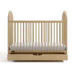 Olivia driftwood crib with drawer open front view