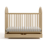 Olivia driftwood crib with drawer open front view