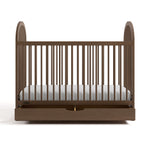 Olivia hazelnut crib with drawer open front view