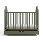 Olivia olive crib with drawer open front view