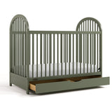 Olivia olive crib with drawer open angle view