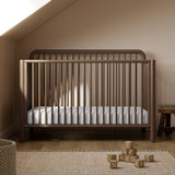 Porto hazelnut crib in a nursery