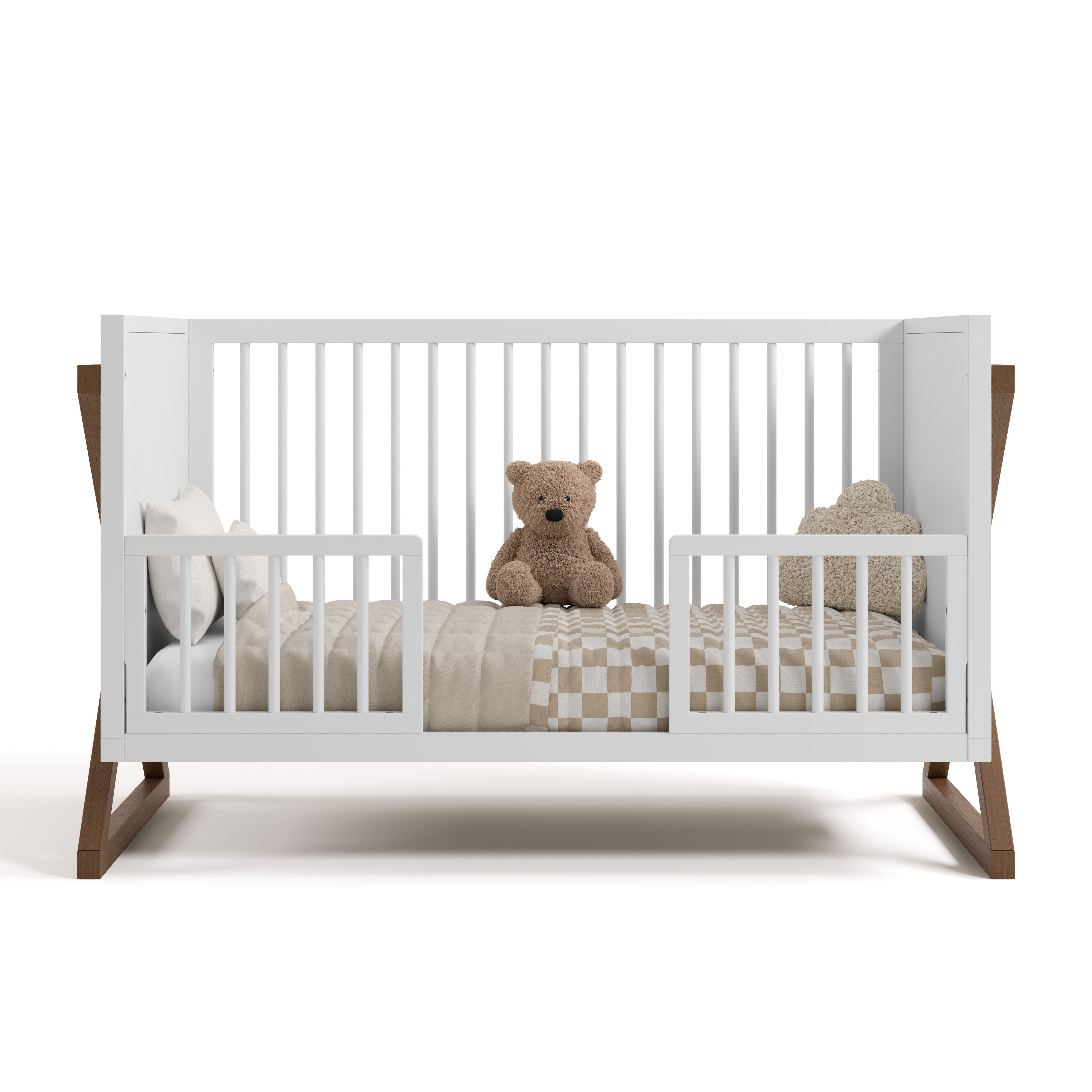 Equinox white with hazelnut crib converted to toddler bed with two guardrails