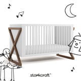 Equinox white with hazelnut crib with black doodles overlaid on image