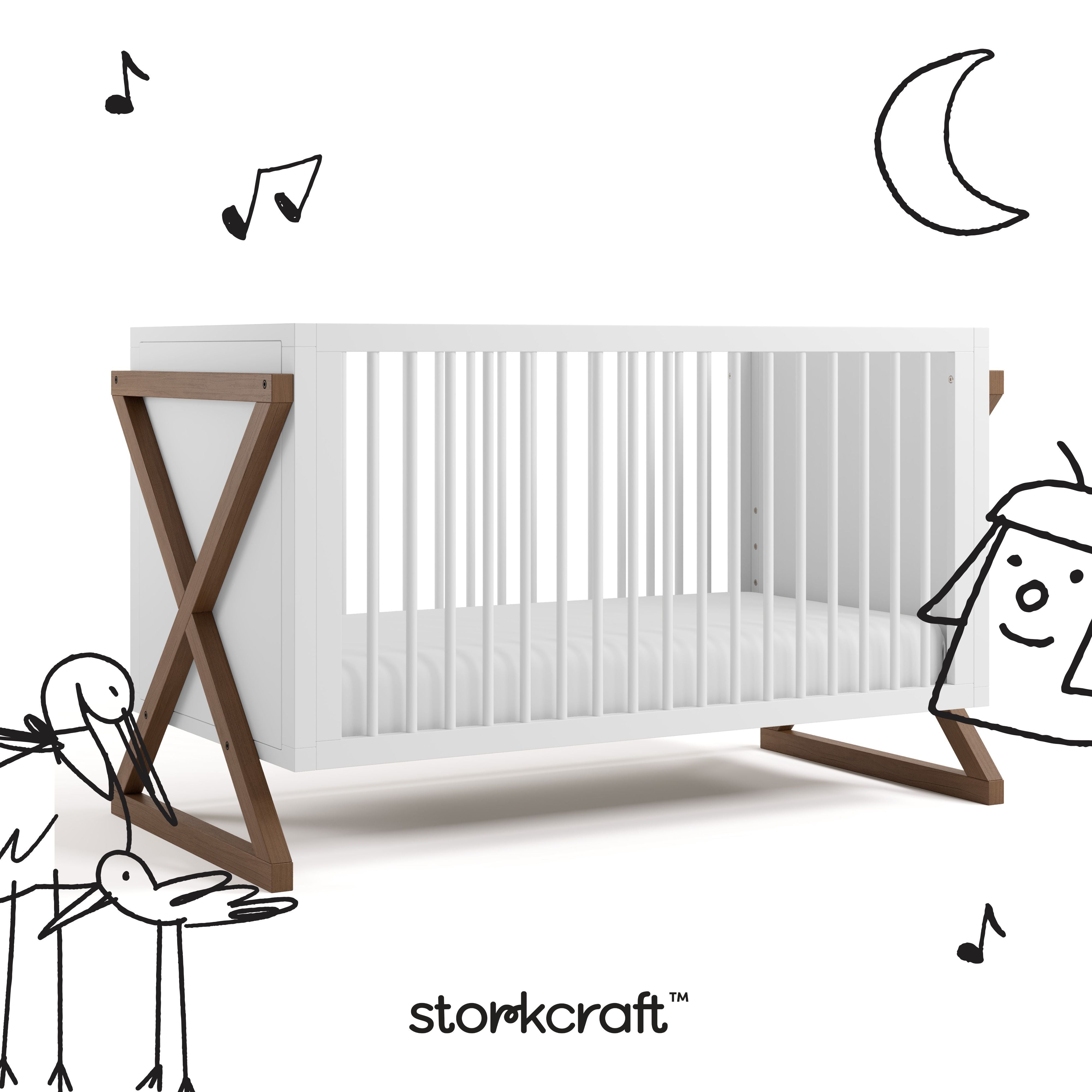 Equinox white with hazelnut crib with black doodles overlaid on image