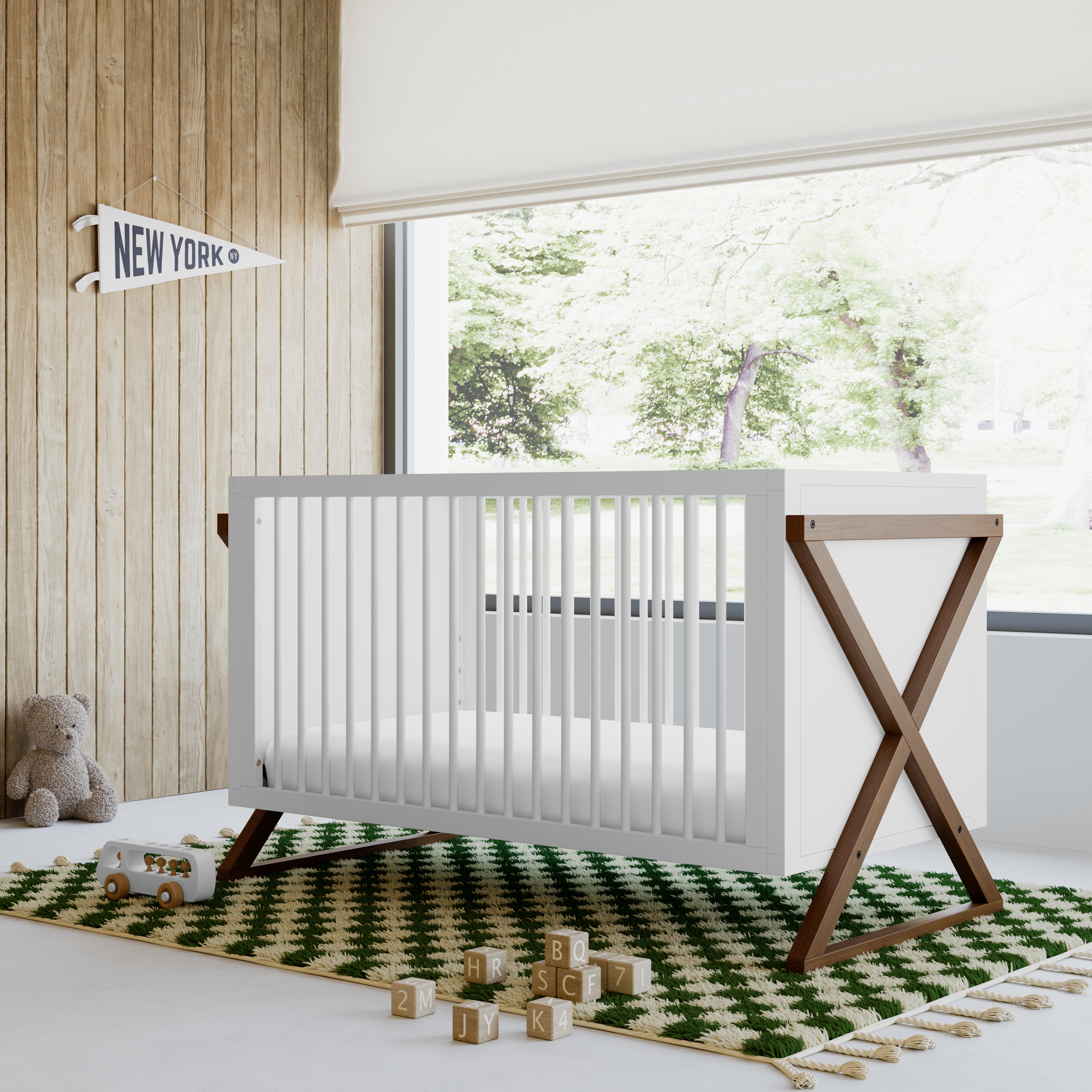 Equinox white with hazelnut crib in a nursery