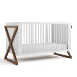 Equinox white with hazelnut crib angle view