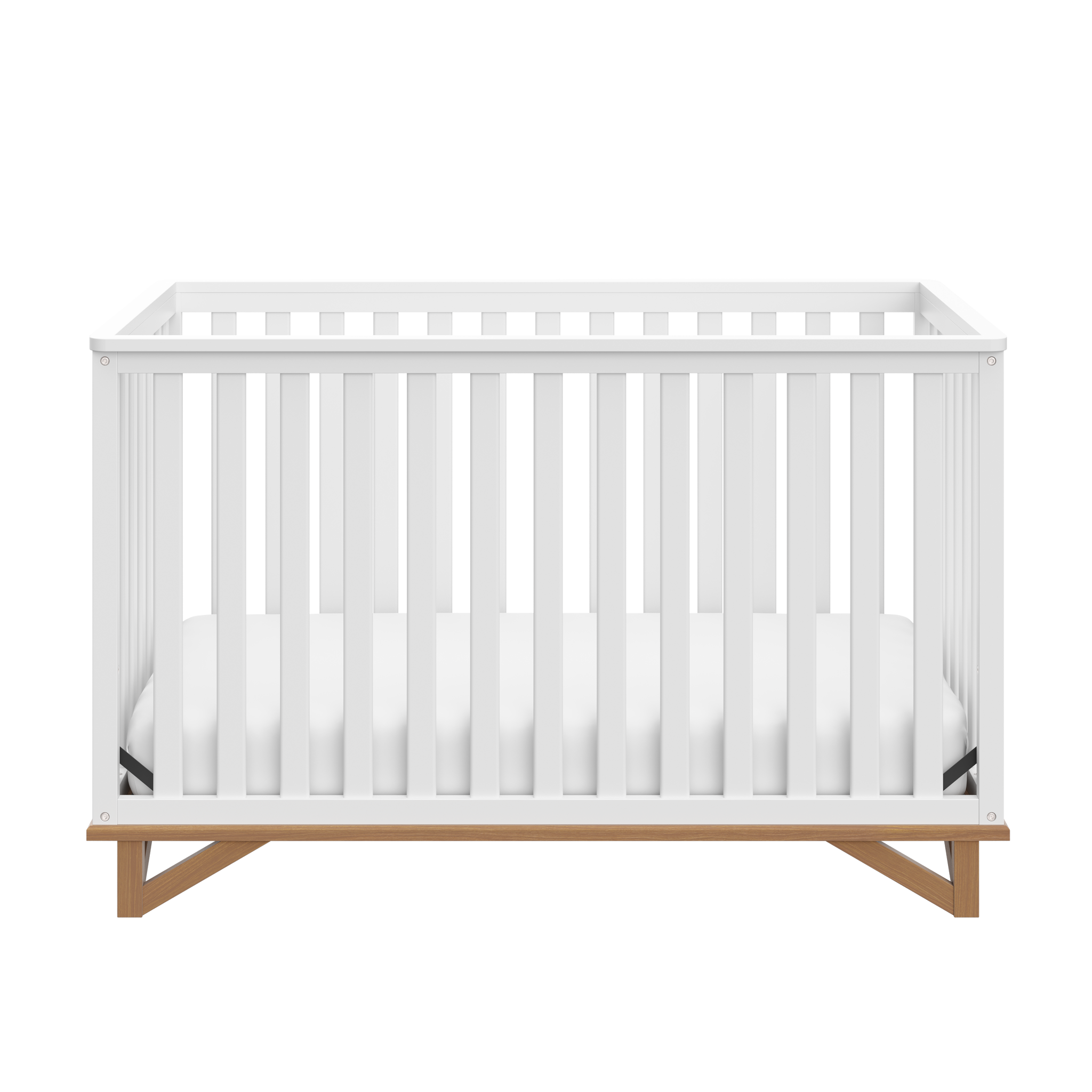 Front view of white crib with driftwood